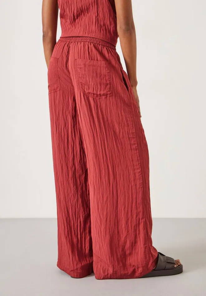 Hush Trousers Women Mabel Fluid Wide Leg Crinkle Trousers Rust Hush Trousers Women Mabel Fluid Wide Leg Crinkle Trousers Rust