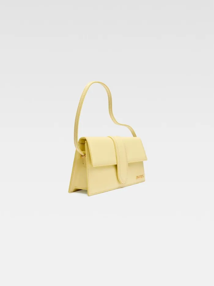 Women Shoulder Bags JACQUEMUS The Long Bambino Pale Yellow Women Shoulder Bags JACQUEMUS The Long Bambino Pale Yellow