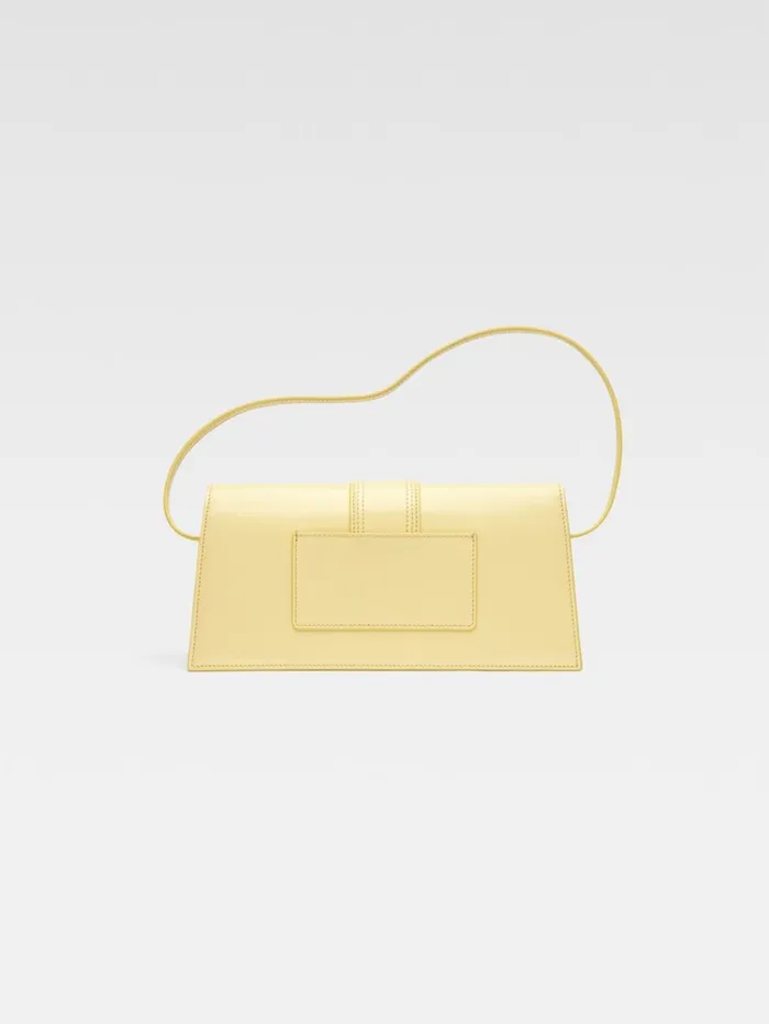 Women Shoulder Bags JACQUEMUS The Long Bambino Pale Yellow Women Shoulder Bags JACQUEMUS The Long Bambino Pale Yellow