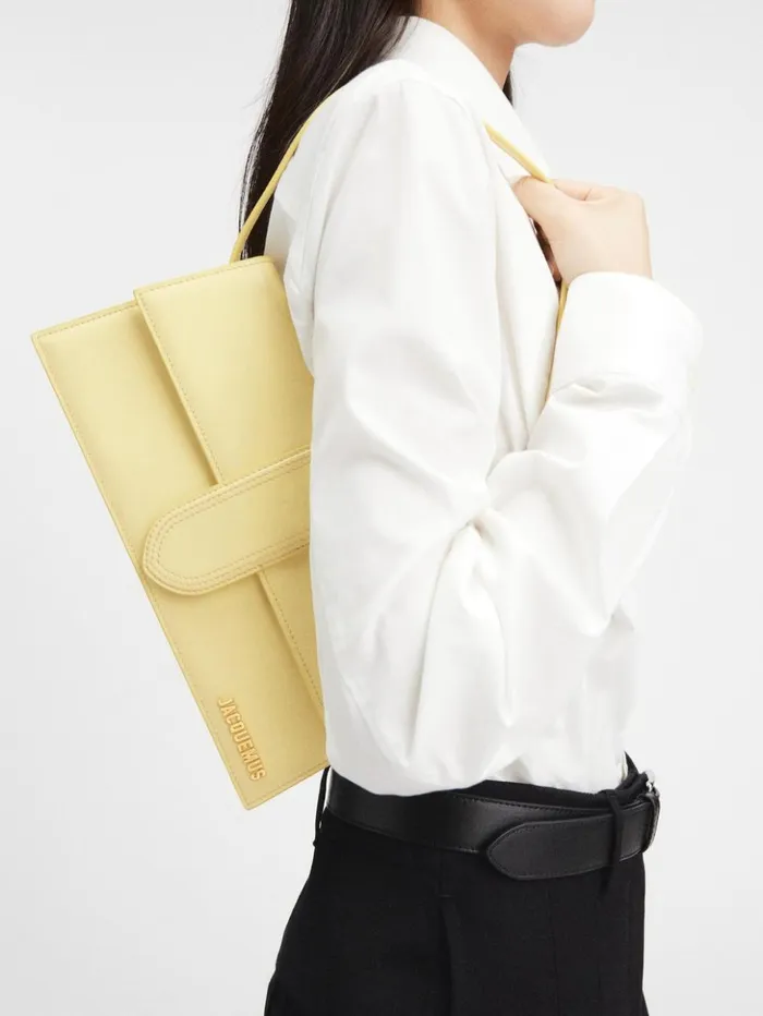 Women Shoulder Bags JACQUEMUS The Long Bambino Pale Yellow Women Shoulder Bags JACQUEMUS The Long Bambino Pale Yellow